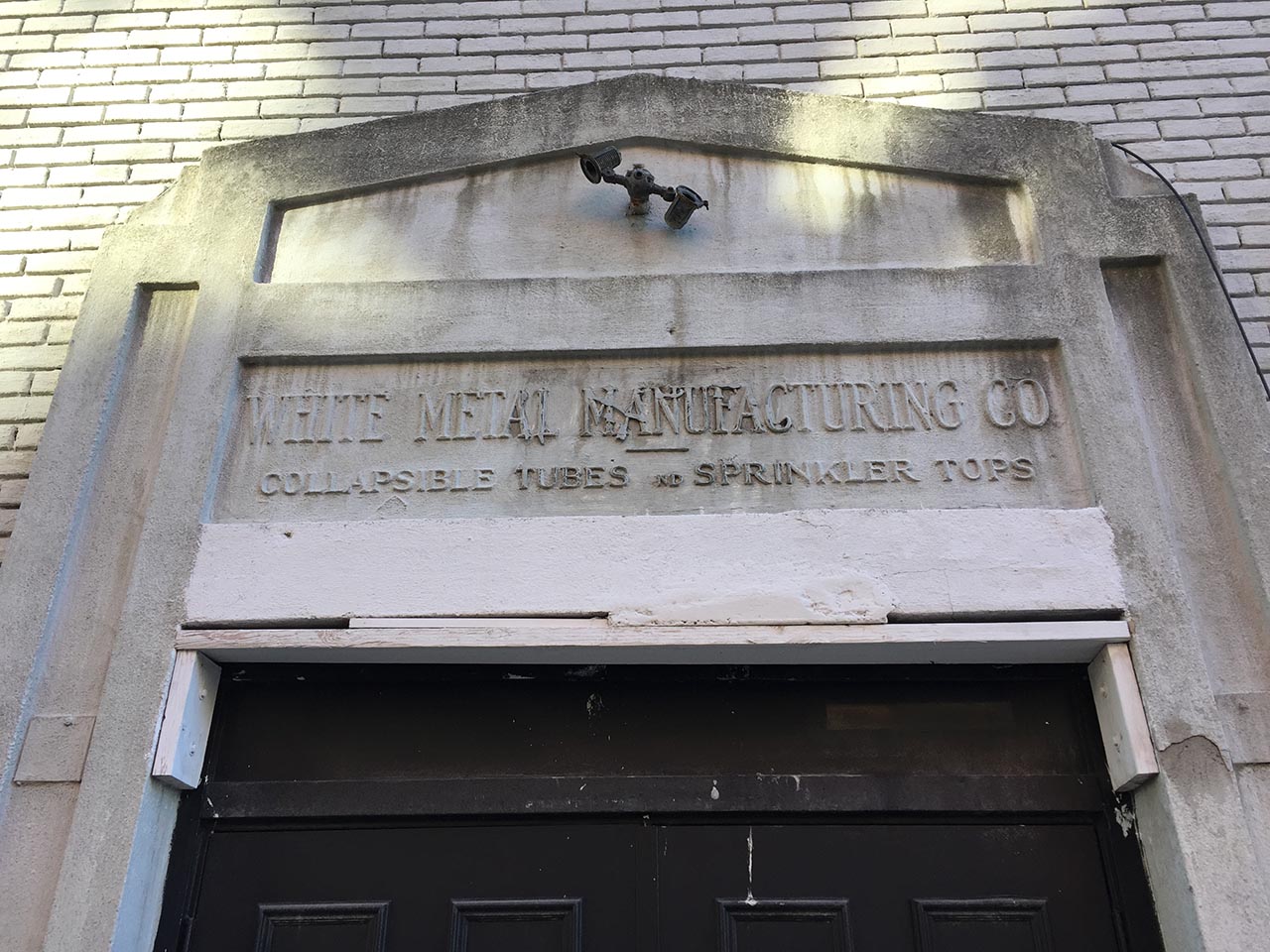 Hoboken Signs White Metal Manufacturing
