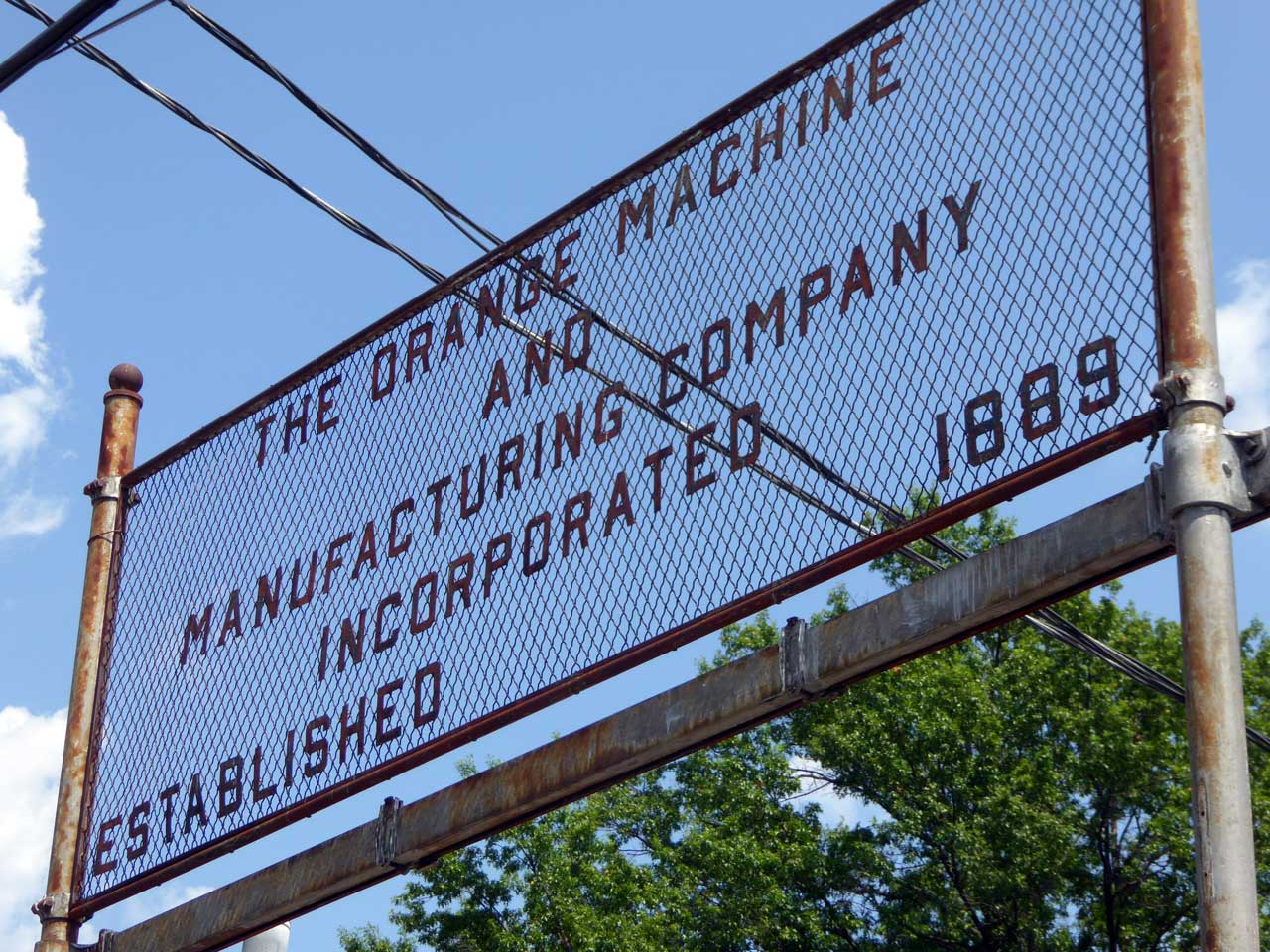 Orange Former Orange Machine And Manufacturing Company Sign