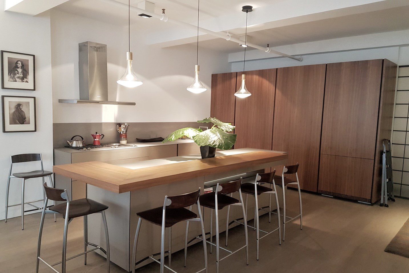 Austrian high-end cabinets in walnut, champagne aluminum finishes, Chelsea, New York City. Source: Design Konstructive